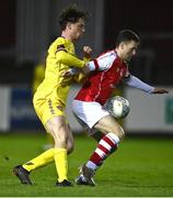 31 January 2023; Jason McClelland of St Patrick's Athletic in action against Brandon McCann of Wexford FC during the Leinster Senior Cup fourth round match between Patrick's Athletic and Wexford at Richmond Park in Dublin. Photo by David Fitzgerald/Sportsfile