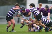 1 February 2023; Dermot Collins of Clongowes Wood College is tackled by Keith Byrne, left, and Thomas Costello of Terenure College during the Bank of Ireland Leinster Rugby Schools Senior Cup First Round match between Terenure College and Clongowes Wood College at Energia Park in Dublin. Photo by Ben McShane/Sportsfile