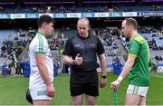 22 January 2023; Referee Johnny Murphy performs the coin toss with team captains Ronan Corcoran of Shamrocks Ballyhale and Paul Shiels of Dunloy Cúchullain's before the AIB GAA Hurling All-Ireland Senior Club Championship Final match between Shamrocks Ballyhale of Kilkenny and Dunloy Cúchullain's of Antrim at Croke Park in Dublin. Photo by Piaras Ó Mídheach/Sportsfile