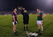28 January 2023; Referee Joe McQuillan performs the coin toss alongside team captains Seán Kelly of Galway and Stephen Coen of Mayo before the Allianz Football League Division 1 match between Mayo and Galway at Hastings Insurance MacHale Park in Castlebar, Mayo. Photo by Piaras Ó Mídheach/Sportsfile