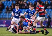 2 February 2023; David Leane of St Mary’s College is tackled by Finn O’Neill of Wesley College during the Bank of Ireland Leinster Rugby Schools Senior Cup First Round match between St Mary’s College and Wesley College at Energia Park in Dublin. Photo by Daire Brennan/Sportsfile