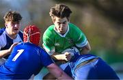 3 February 2023; Hugo McLaughlin of Gonzaga College is tackled by Jude McCrea, left, and Jack Bourke of St Andrews School during the Bank of Ireland Leinster Rugby Schools Senior Cup First Round match between Gonzaga College and St Andrew's College at Clontarf RFC in Dublin. Photo by Eóin Noonan/Sportsfile