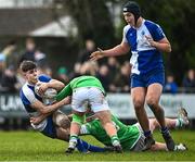 3 February 2023; Francis Manzocchi of St Andrews School is tackled by Luke McLaughlin of Gonzaga College during the Bank of Ireland Leinster Rugby Schools Senior Cup First Round match between Gonzaga College and St Andrew's College at Clontarf RFC in Dublin. Photo by Eóin Noonan/Sportsfile