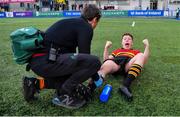 3 February 2023; Eoghan O'Hanlon of CBC Monkstown receives medical attention after the Bank of Ireland Leinster Rugby Schools Senior Cup First Round match between CBC Monkstown and St Vincent’s Castleknock College at Energia Park in Dublin. Photo by Tyler Miller/Sportsfile