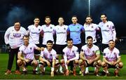 3 February 2023; The Dundalk team, back row, from left, John Martin, Connor Malley, Hayden Muller, goalkeeper Peter Cherrie, Andy Boyle and Louis Annesley. Front row, from left, Greg Sloggett, Ryan O'Kane, Archie Davies, captain Patrick Hoban and Keith Ward, with Dundalk supporter Killian Moran, left, before the Jim Malone Cup match between Drogheda United and Dundalk at Weaver's Park in Drogheda, Louth. Photo by Ben McShane/Sportsfile