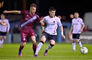 3 February 2023; Ryan O'Kane of Dundalk in action against Ben Curtis of Drogheda United during the Jim Malone Cup match between Drogheda United and Dundalk at Weaver's Park in Drogheda, Louth. Photo by Ben McShane/Sportsfile
