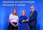 3 February 2023; Ulster recipient Margaret Keenan of St Patrick’s GFC, Gortin, Tyrone, centre, is presented with her award by Uachtarán Chumann Lúthchleas Gael Larry McCarthy and AIB head of marketing engagement Nuala Kroondijk during the GAA President's Awards at Croke Park in Dublin. Photo by Seb Daly/Sportsfile