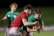 3 February 2023; John Devine of Ireland in action against Ryan Woodman of Wales during the U20 Six Nations Rugby Championship match between Wales and Ireland at Stadiwm CSM in Colwyn Bay, Wales. Photo by Paul Greenwood/Sportsfile