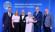 3 February 2023; The Mallon family of St Paulâ€™s Lurgan, Armagh, from left, DÃ¡ire O Dubhthaigh, Philip Snr, Pat, and Philip Jnr, are presented with the Dermot Earley Family award by UachtarÃ¡n Chumann LÃºthchleas Gael Larry McCarthy, second right, and AIB head of marketing engagement Nuala Kroondijk, second left, during the GAA President's Awards at Croke Park in Dublin. Photo by Seb Daly/Sportsfile