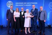 3 February 2023; The Mallon family of St Paulâ€™s Lurgan, Armagh, from left, DÃ¡ire O Dubhthaigh, Philip Snr, Pat, and Philip Jnr, are presented with the Dermot Earley Family award by UachtarÃ¡n Chumann LÃºthchleas Gael Larry McCarthy, second right, and AIB head of marketing engagement Nuala Kroondijk, second left, during the GAA President's Awards at Croke Park in Dublin. Photo by Seb Daly/Sportsfile
