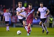 3 February 2023; Dayle Rooney of Drogheda United in action against Greg Sloggett of Dundalk during the Jim Malone Cup match between Drogheda United and Dundalk at Weaver's Park in Drogheda, Louth. Photo by Ben McShane/Sportsfile