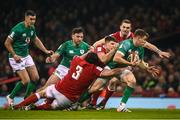 4 February 2023; Garry Ringrose of Ireland is tackled by Tomas Francis, 3, Joe Hawkins and George North, right, of Wales during the Guinness Six Nations Rugby Championship match between Wales and Ireland at Principality Stadium in Cardiff, Wales. Photo by David Fitzgerald/Sportsfile