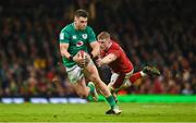 4 February 2023; Dan Sheehan of Ireland evades the tackle of Jac Morgan of Wales during the Guinness Six Nations Rugby Championship match between Wales and Ireland at Principality Stadium in Cardiff, Wales. Photo by Brendan Moran/Sportsfile