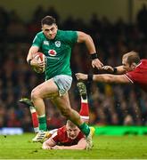 4 February 2023; Dan Sheehan of Ireland beats the tackle of Jac Morgan and Alun Wyn Jones, right, of Wales during the Guinness Six Nations Rugby Championship match between Wales and Ireland at Principality Stadium in Cardiff, Wales. Photo by Brendan Moran/Sportsfile