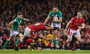 4 February 2023; James Lowe of Ireland is tackled by Taulupe Faletau of Wales during the Guinness Six Nations Rugby Championship match between Wales and Ireland at Principality Stadium in Cardiff, Wales. Photo by Brendan Moran/Sportsfile