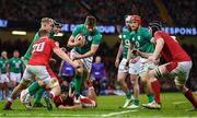 4 February 2023; Ross Byrne of Ireland breaks a tackle during the Guinness Six Nations Rugby Championship match between Wales and Ireland at Principality Stadium in Cardiff, Wales. Photo by Brendan Moran/Sportsfile