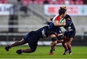 4 February 2023; Deirbhile Nic a Bhaird of Combined Provinces XV is tackled by Panashe Mazumbe, left, and Mairi McDonald of The Thistles during the Celtic Challenge 2023 match between Combined Provinces XV and The Thistles at Kingspan Stadium in Belfast. Photo by Ben McShane/Sportsfile