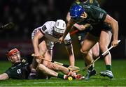 4 February 2023; Seán O'Hanlon of Galway in action against Wexford players Diarmuid O'Keeffe, left, and Shane Reck during the Allianz Hurling League Division 1 Group A match between Wexford and Galway at Chadwicks Wexford Park in Wexford. Photo by Piaras Ó Mídheach/Sportsfile