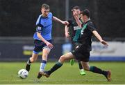 4 February 2023; Alex Nolan of UCD is tackled by Freddie Turley of Shamrock Rovers during the Leinster Senior Cup fourth round match between UCD and Shamrock Rovers at UCD Bowl in Dublin. Photo by Tyler Miller/Sportsfile