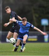 4 February 2023; Alex Nolan of UCD in action against Markus Poom of Shamrock Rovers during the Leinster Senior Cup fourth round match between UCD and Shamrock Rovers at UCD Bowl in Dublin. Photo by Tyler Miller/Sportsfile
