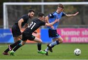 4 February 2023; Alex Nolan of UCD in action against Kieran Cruise of Shamrock Rovers during the Leinster Senior Cup fourth round match between UCD and Shamrock Rovers at UCD Bowl in Dublin. Photo by Tyler Miller/Sportsfile