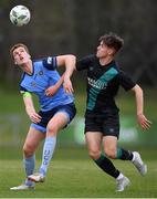 4 February 2023; Jack Keaney of UCD and Johnny Kenny of Shamrock Rovers battle for possession during the Leinster Senior Cup fourth round match between UCD and Shamrock Rovers at UCD Bowl in Dublin. Photo by Tyler Miller/Sportsfile