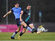 4 February 2023; Neil Farrugia of Shamrock Rovers is tackled by Dara Keane of UCD during the Leinster Senior Cup fourth round match between UCD and Shamrock Rovers at UCD Bowl in Dublin. Photo by Tyler Miller/Sportsfile