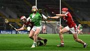 4 February 2023; Cian Lynch of Limerick is tackled by Conor O’Callaghan, left, and Ciarán Joyce of Cork during the Allianz Hurling League Division 1 Group A match between Cork and Limerick at Páirc Ui Chaoimh in Cork. Photo by Eóin Noonan/Sportsfile