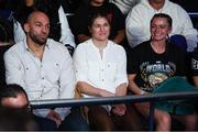 4 February 2023; Katie Taylor, centre, trainer Ross Enamait, left, and boxer Skye Nicolson, right, watch on during the undisputed world featherweight championship fight between Amanda Serrano and Erika Cruz at Madison Square Garden Theatre in New York, USA. Following the fight it was announced Taylor and Serrano would meet in Dublin on May 20 for their rematch for the undisputed world lightweight titles. Photo by Ed Mulholland / Matchroom Boxing via Sportsfile