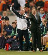 5 June 2004; Brian Kerr, Republic of Ireland manager, and coach Noel O'Reilly, left, shout instructions during the closing stages of the game. International Friendly, Holland v Republic of Ireland, Amsterdam Arena, Amsterdam, Holland. Picture credit; David Maher / SPORTSFILE