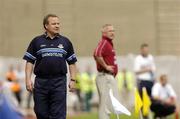 6 June 2004; Dublin manager Tommy Lyons watches the game as Westmeath manager Paidi O'Se looks on. Bank of Ireland Leinster Senior Football Championship, Dublin v Westmeath, Croke Park, Dublin. Picture credit; Matt Browne / SPORTSFILE