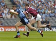 6 June 2004; Darren Magee, Dublin, is tackled by Gary Dolan, Westmeath. Bank of Ireland Leinster Senior Football Championship, Dublin v Westmeath, Croke Park, Dublin. Picture credit; David Maher / SPORTSFILE