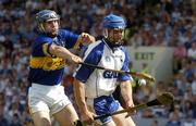 6 June 2004; Declan Prendergast, Waterford, in action against Eoin Kelly, Tipperary. Guinness Munster Senior Hurling Championship Semi-Final, Tipperary v Waterford, Pairc Ui Chaoimh, Cork. Picture credit; Pat Murphy / SPORTSFILE