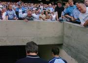 6 June 2004; Angry Dublin supporters voice their opinions to Dublin manager Tommy Lyons , bottom of picture, as he leaves the pitch after defeat to Westmeath. Bank of Ireland Leinster Senior Football Championship, Dublin v Westmeath, Croke Park, Dublin. Picture credit; David Maher / SPORTSFILE