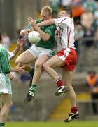 6 June 2004; Sean Cavanagh, Tyrone, in action against Liam McBarron, Fermanagh. Bank of Ireland Ulster Senior Football Championship, Tyrone v Fermanagh, St. Tighernach's Park, Clones, Co. Monaghan. Picture credit; Damien Eagers / SPORTSFILE