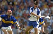6 June 2004; Dan Shanahan, Waterford, scores his sides first goal despite the attentions of Diarmaid Fitzgerald, Tipperary. Guinness Munster Senior Hurling Championship semi-final, Tipperary v Waterford, Pairc Ui Chaoimh, Cork. Picture credit; Brendan Moran / SPORTSFILE