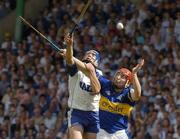 6 June 2004; John Devane, Tipperary, in action against Declan Prendergast, Waterford. Guinness Munster Senior Hurling Championship Semi-Final, Tipperary v Waterford, Pairc Ui Chaoimh, Cork. Picture credit; Pat Murphy / SPORTSFILE