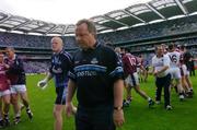 6 June 2004; A dejected Tommy Lyons , Dublin manager, leaves the pitch after defeat to Westmeath. Bank of Ireland Leinster Senior Football Championship, Dublin v Westmeath, Croke Park, Dublin. Picture credit; David Maher / SPORTSFILE
