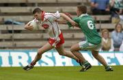 6 June 2004; Sean Cavanagh, Tyrone, in action against Shane McDermott, Fermanagh. Bank of Ireland Ulster Senior Football Championship, Tyrone v Fermanagh, St. Tighernach's Park, Clones, Co. Monaghan. Picture credit; Damien Eagers / SPORTSFILE