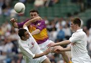 6 June 2004; Jason Lawlor, Wexford, in action against Karl Ennis, left, and Rob McCabe, Kildare. Bank of Ireland Leinster Senior Football Championship, Wexford v Kildare, Croke Park, Dublin. Picture credit; David Maher / SPORTSFILE