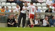 6 June 2004; Tyrone's Brian McGuigan with Tyrone manager Mickey Harte after having been shown the red card. Bank of Ireland Ulster Senior Football Championship, Tyrone v Fermanagh, St. Tighernach's Park, Clones, Co. Monaghan. Picture credit; Damien Eagers / SPORTSFILE