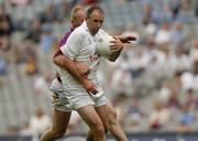 6 June 2004; Glenn Ryan, Kildare, is tackled by Willie Carley, Wexford. Bank of Ireland Leinster Senior Football Championship, Wexford v Kildare, Croke Park, Dublin. Picture credit; Matt Browne / SPORTSFILE