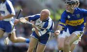 6 June 2004; John Mullane, Waterford, in action against Thomas Costello, Tipperary. Guinness Munster Senior Hurling Championship semi-final, Tipperary v Waterford, Pairc Ui Chaoimh, Cork. Picture credit; Brendan Moran / SPORTSFILE