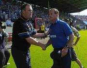 6 June 2004; Tipperary manager Ken Hogan, left, congratulates Waterford manager Justin McCarthy at the end of the game. Guinness Munster Senior Hurling Championship Semi-Final, Tipperary v Waterford, Pairc Ui Chaoimh, Cork. Picture credit; Brendan Moran / SPORTSFILE
