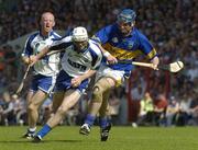 6 June 2004; Paul O'Brien, Waterford, in action against Tipperary's Martin Maher. Guinness Munster Senior Hurling Championship Semi-Final, Tipperary v Waterford, Pairc Ui Chaoimh, Cork. Picture credit; Pat Murphy / SPORTSFILE