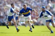 6 June 2004; Conor Gleeson, Tipperary, in action against Brian Phelan, left, and Michael Walsh, Waterford. Guinness Munster Senior Hurling Championship semi-final, Tipperary v Waterford, Pairc Ui Chaoimh, Cork. Picture credit; Brendan Moran / SPORTSFILE