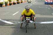 7 June 2004; Patrice Dockery comes home to win the Wheelchair section of the 2004 Flora Women's Mini-Marathon. Dublin. Picture credit; Brendan Moran / SPORTSFILE