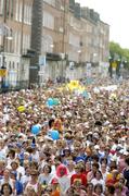 7 June 2004; Some of the thousands of runners make their way along Fitzwillian Square during the 2004 Flora Women's Mini-Marathon. Dublin. Picture credit; Brendan Moran / SPORTSFILE