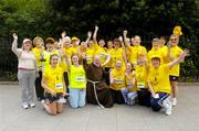 7 June 2004; Brother Kevin Crowley, pictured with women who took part in the Mini Marathon for The Capuchin Day Centre, the Day Centre helps the homeless in Dublin, before the start of the 2004 Flora Women's Mini-Marathon. Dublin. Picture credit; Brendan Moran / SPORTSFILE