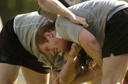 8 June 2004; Paul O'Connell, right, and Malcolm O'Kelly in action during Ireland rugby squad training. The Villages Rugby Ground, Capetown, South Africa. Picture credit; Matt Browne / SPORTSFILE